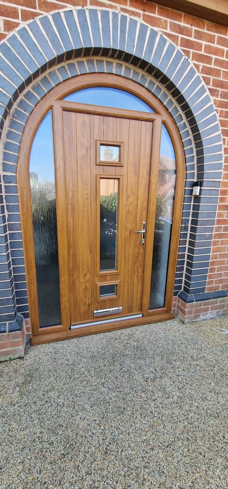 arched brown front door