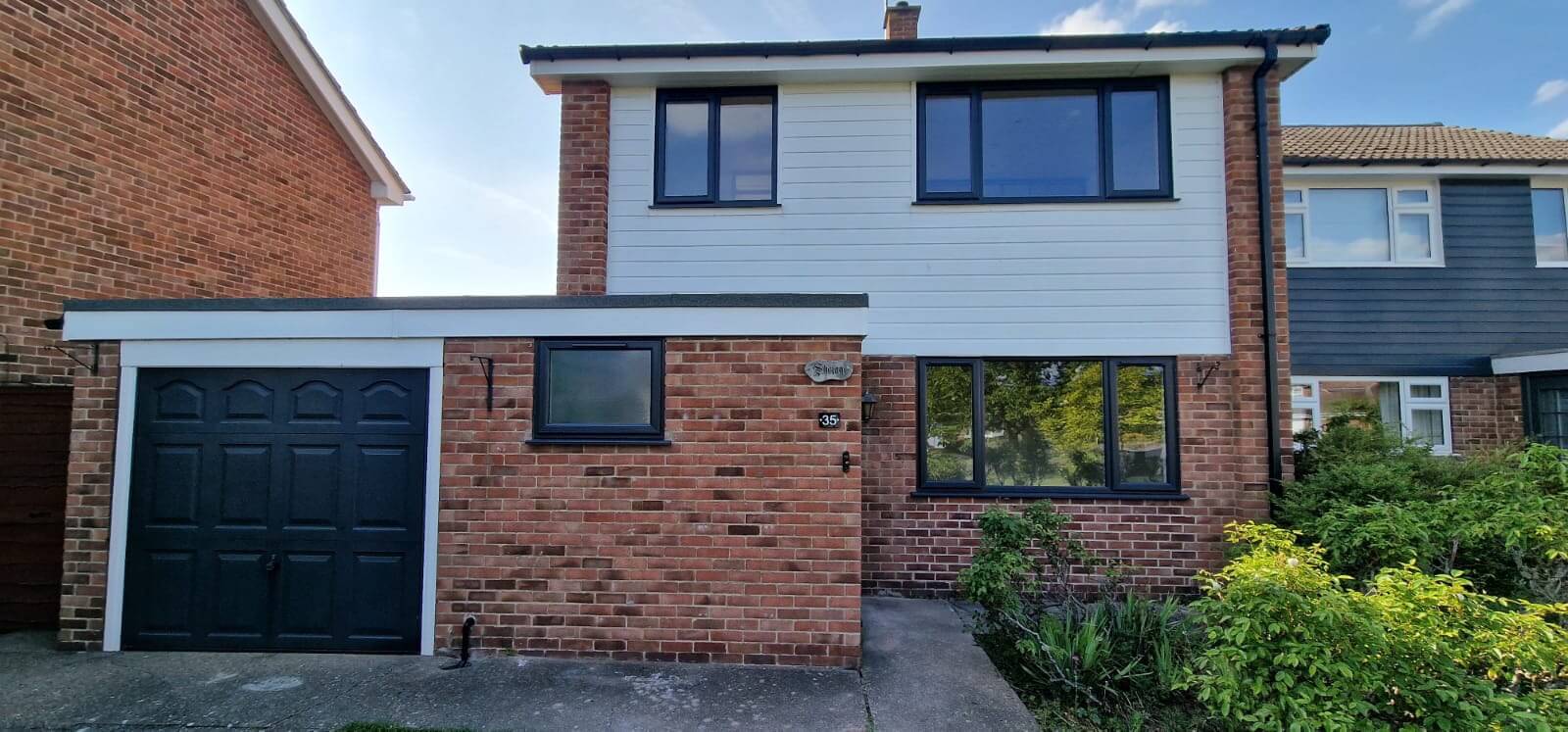 house with black window frames